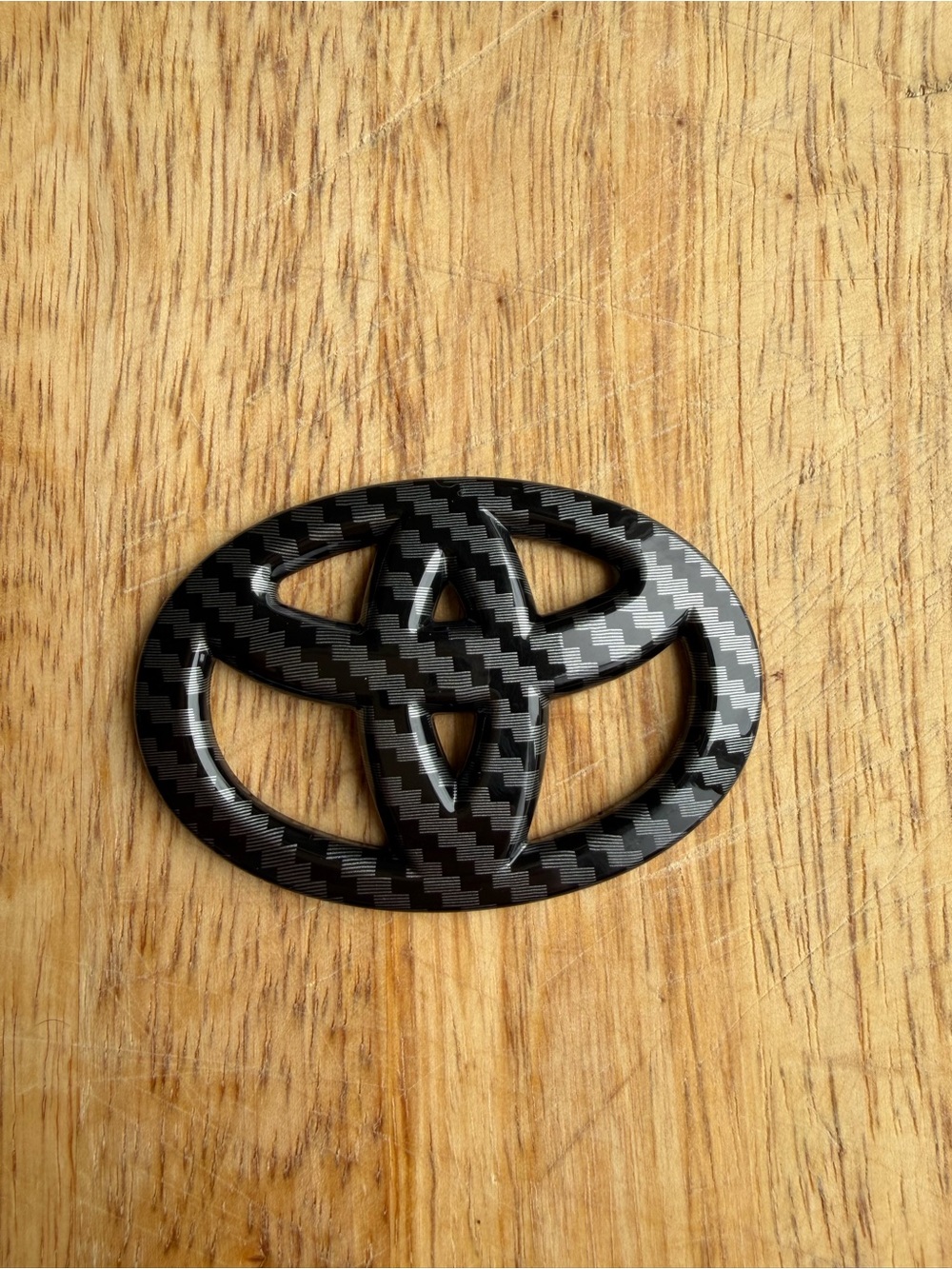 Toyota Carbon Fiber Style Emblem steering overlay - Black